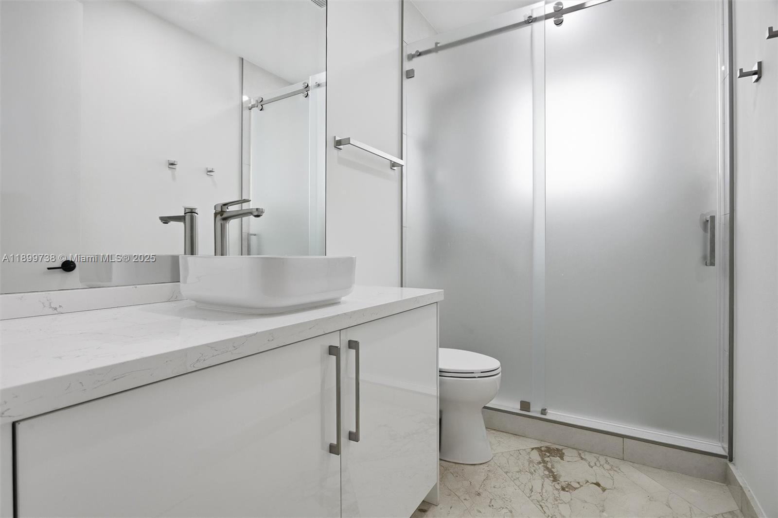 3526 Juniper Lane Davie, FL 33330 - Photo 51 of 79 a bathroom with a sink a toilet and shower