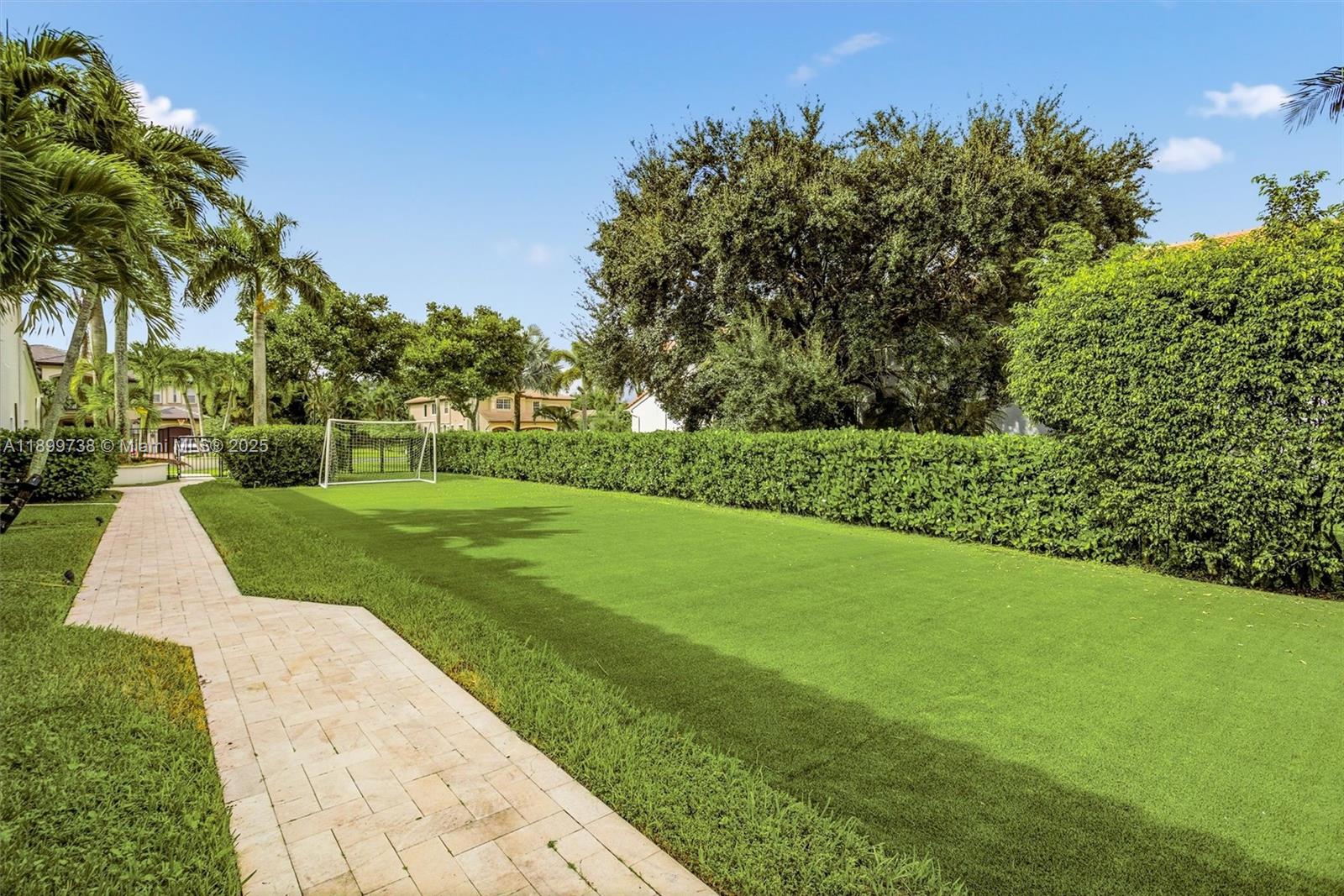 3526 Juniper Lane Davie, FL 33330 - Photo 59 of 79 a view of a park with plants and a palm tree