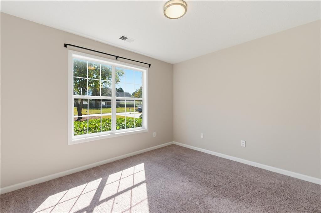 1730 Alcovy River Drive Dacula, GA 30019 - Photo 18 of 30 an empty room with a window