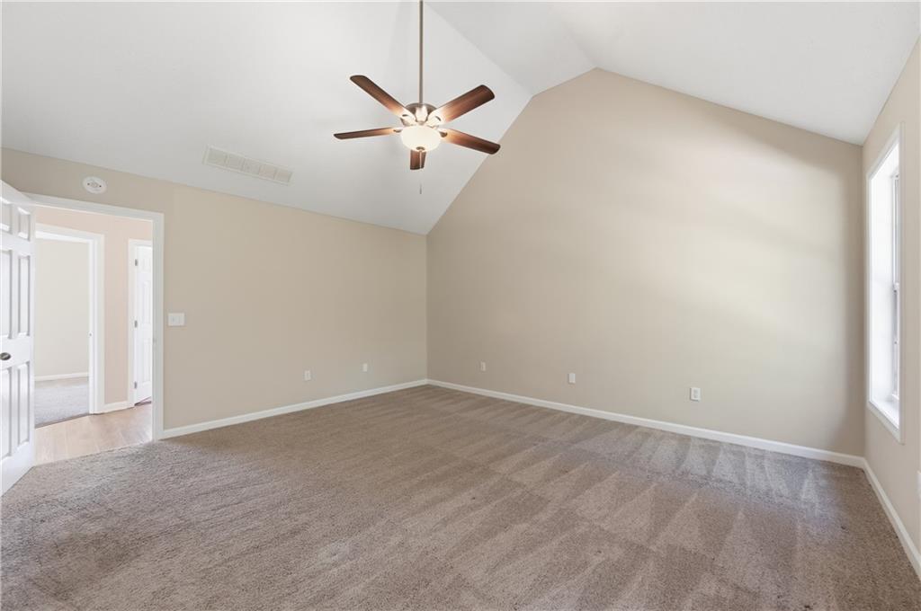 1730 Alcovy River Drive Dacula, GA 30019 - Photo 21 of 30 a view of an empty room with a window