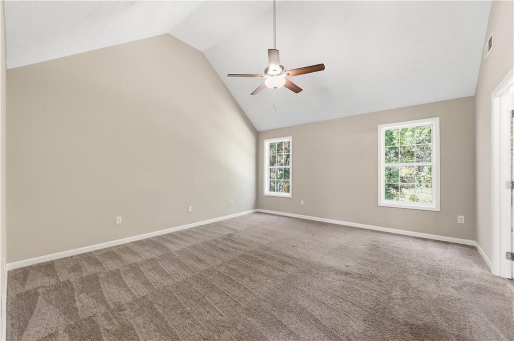 1730 Alcovy River Drive Dacula, GA 30019 - Photo 24 of 30 a view of an empty room with a window