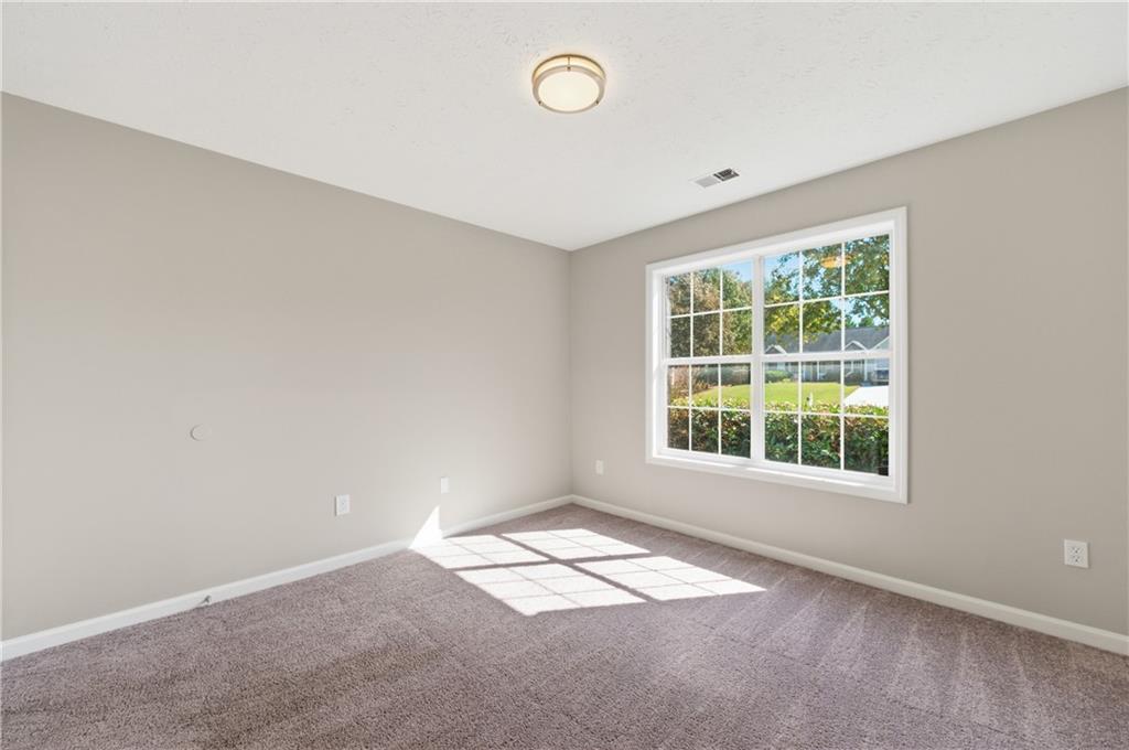 1730 Alcovy River Drive Dacula, GA 30019 - Photo 26 of 30 an empty room with a window