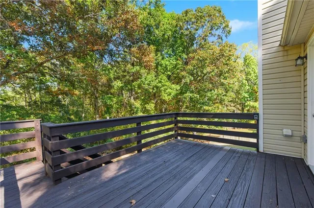 a view of outdoor space with deck and hardwood