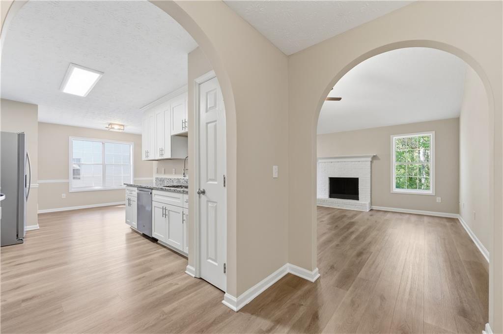 1730 Alcovy River Drive Dacula, GA 30019 - Photo 3 of 30 a view of kitchen with wooden floor