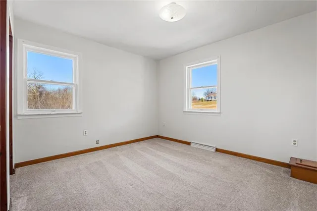 an empty room with windows