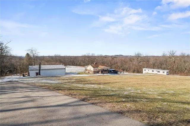 a view of a terrace with yard