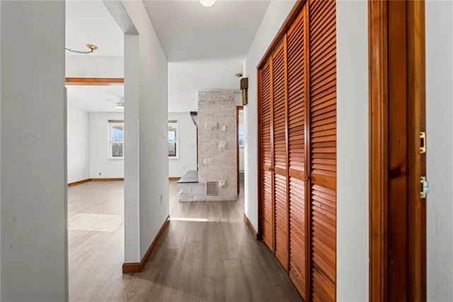 a view of a bathroom from a hallway