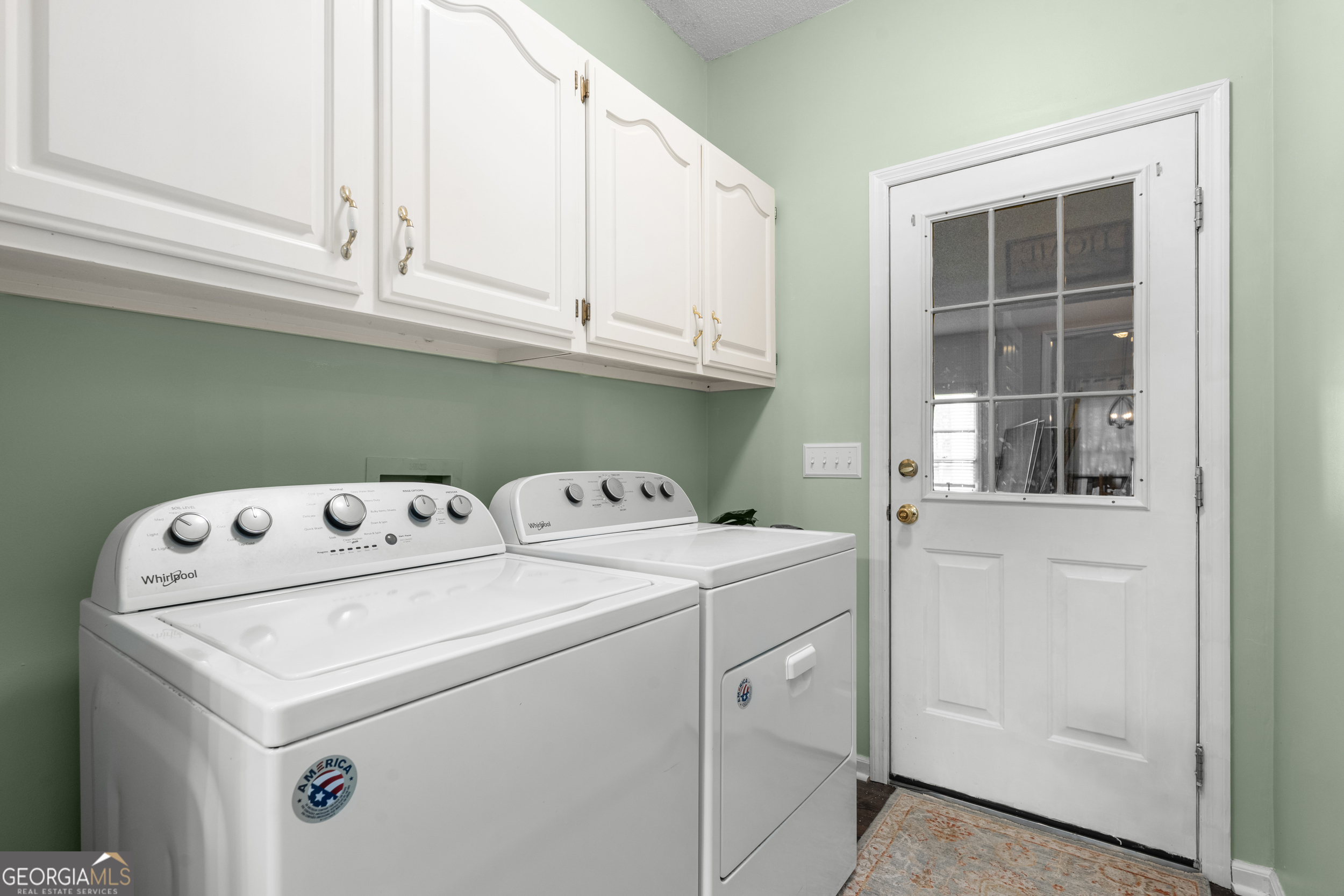 1018 Hunters Pointe Drive Statesboro, GA 30461 - Photo 18 of 21 a utility room with dryer and washer
