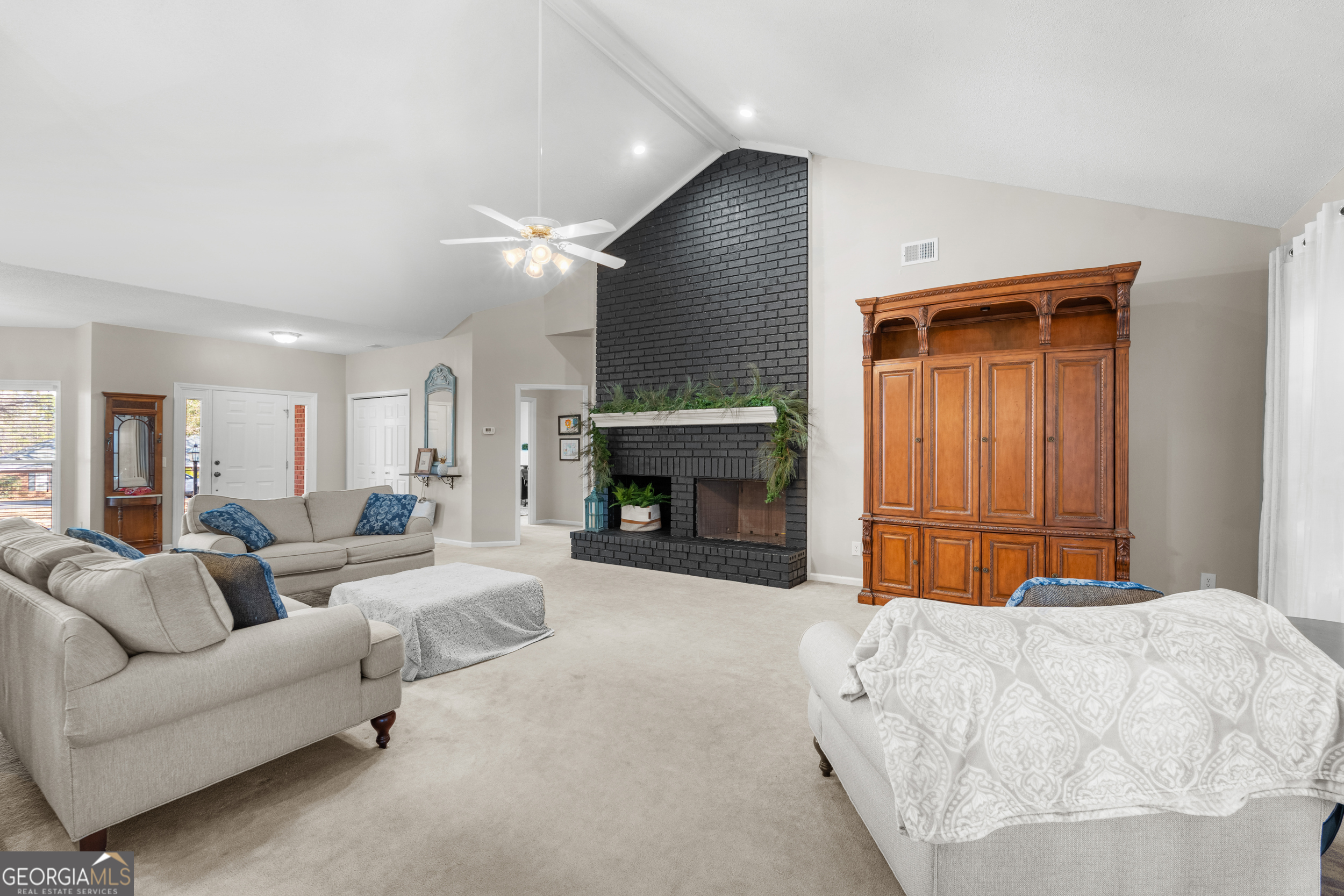 1018 Hunters Pointe Drive Statesboro, GA 30461 - Photo 6 of 21 a bed room with a bed and a fireplace