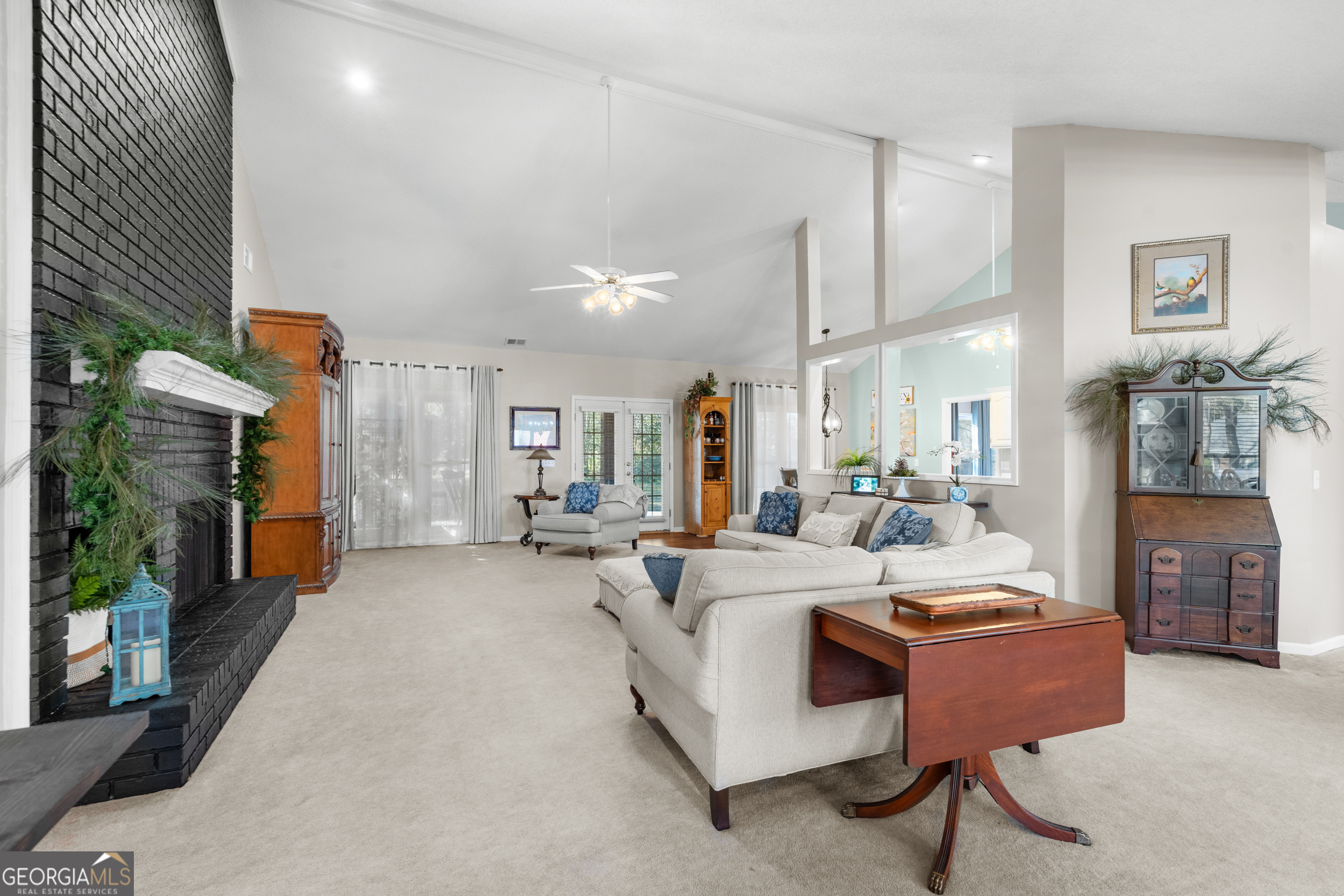 1018 Hunters Pointe Drive Statesboro, GA 30461 - Photo 7 of 21 a living room with furniture and a fireplace