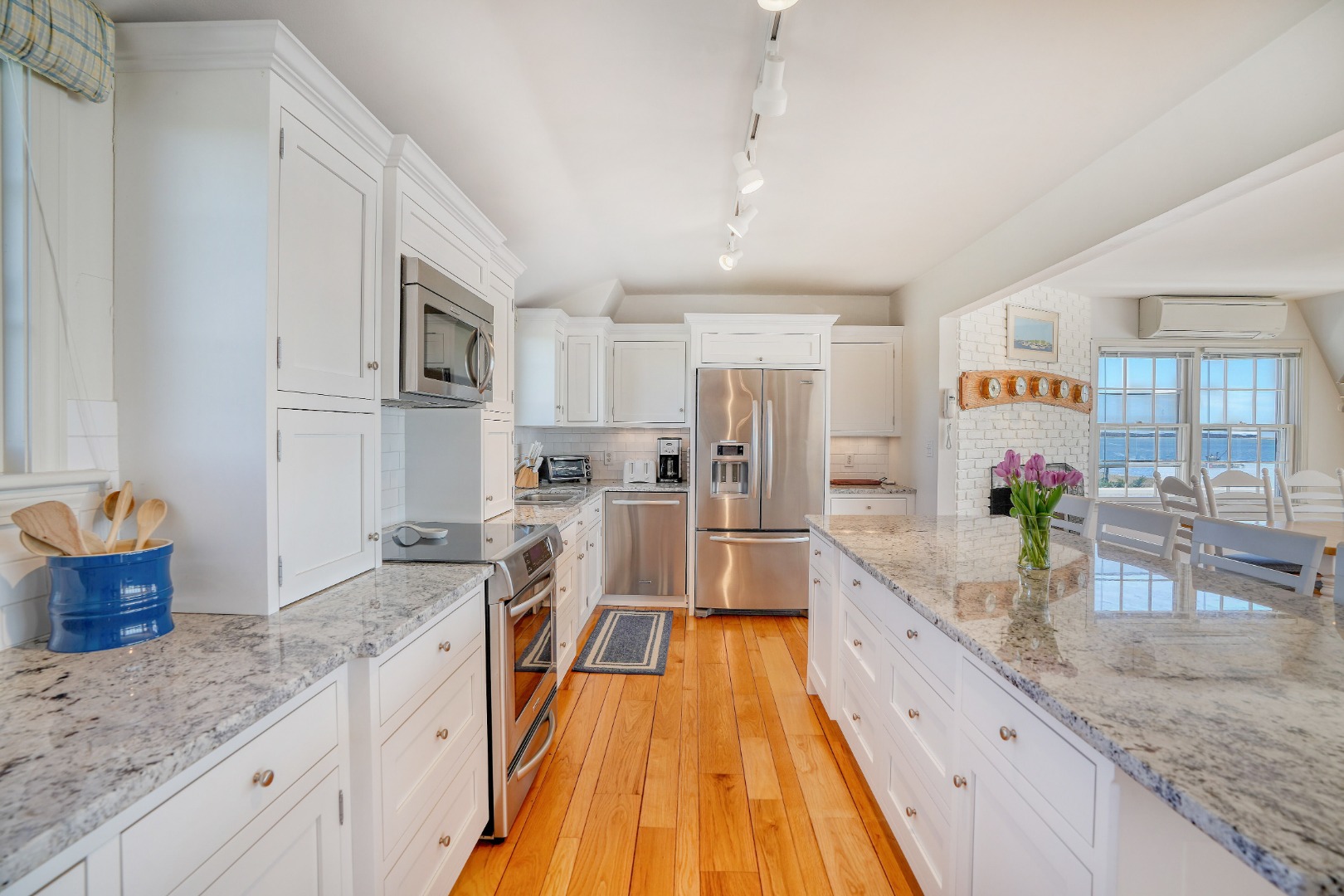 103 Edgartown Bay Road Edgartown, MA 02539 - Photo 7 of 30 Polished granite countertops complement the custom cabinetry