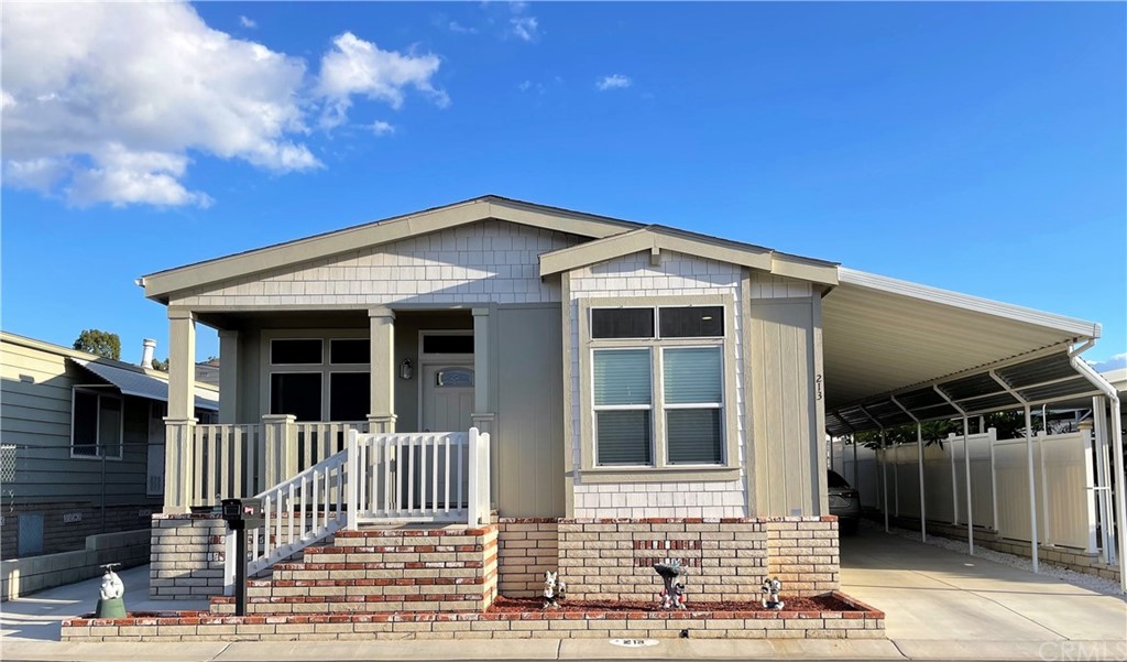 a front view of a house with a porch