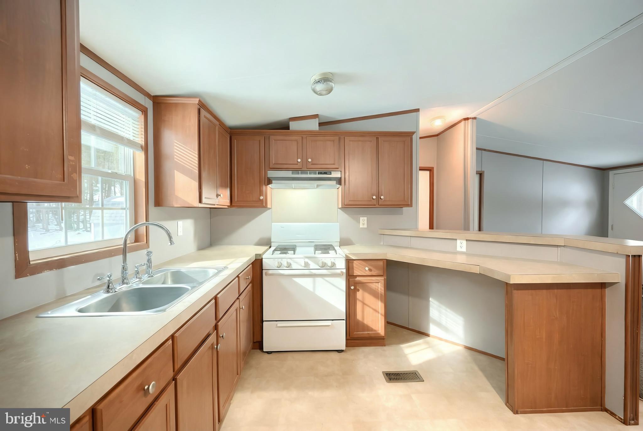299 Nawakwa Road Biglerville, PA 17307 - Photo 8 of 34 Bright and inviting kitchen with modern finishes.