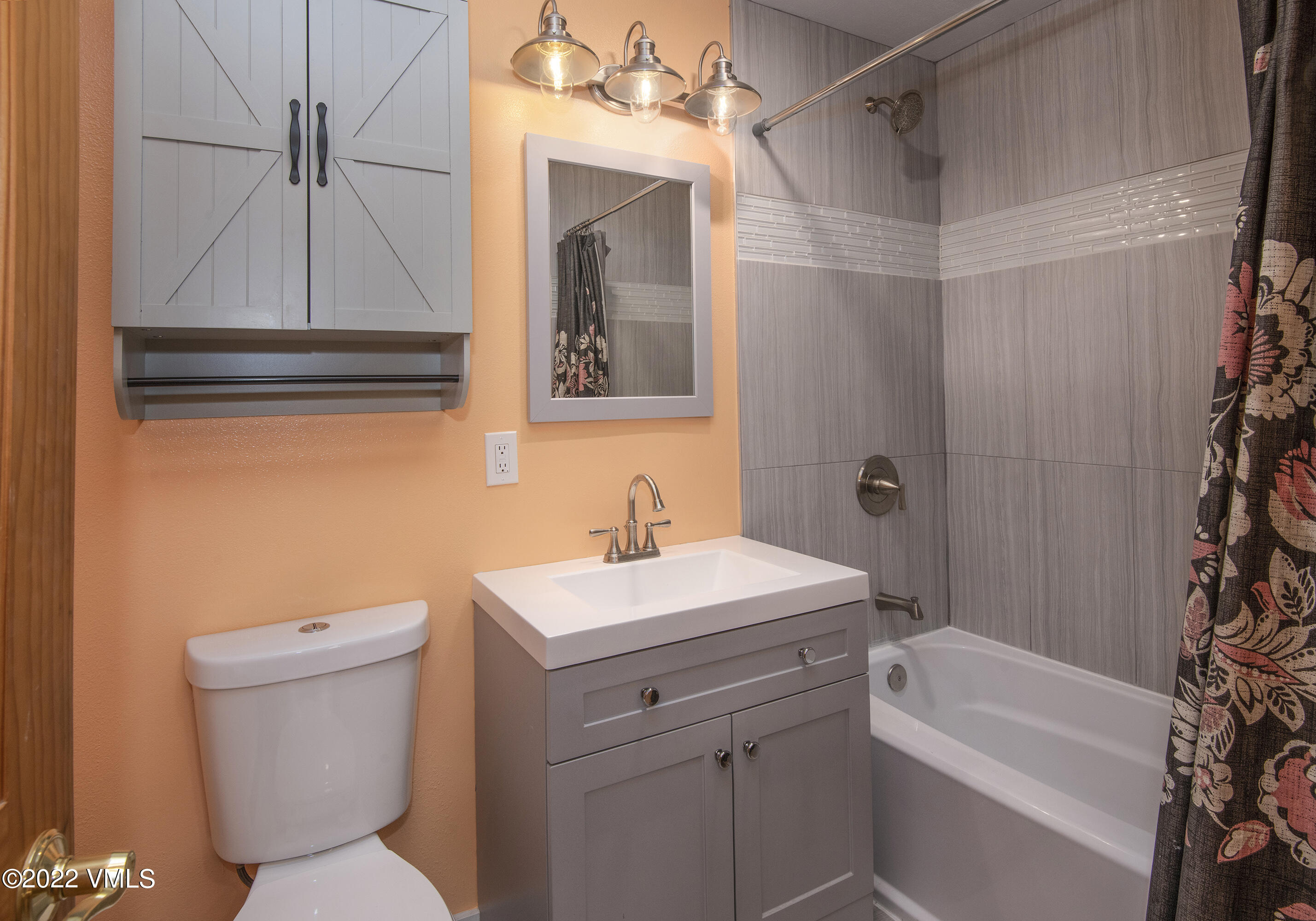 4073 Spruce Way, Unit 22 Vail, CO 81657 - Photo 11 of 25 a bathroom with a sink a toilet and shower