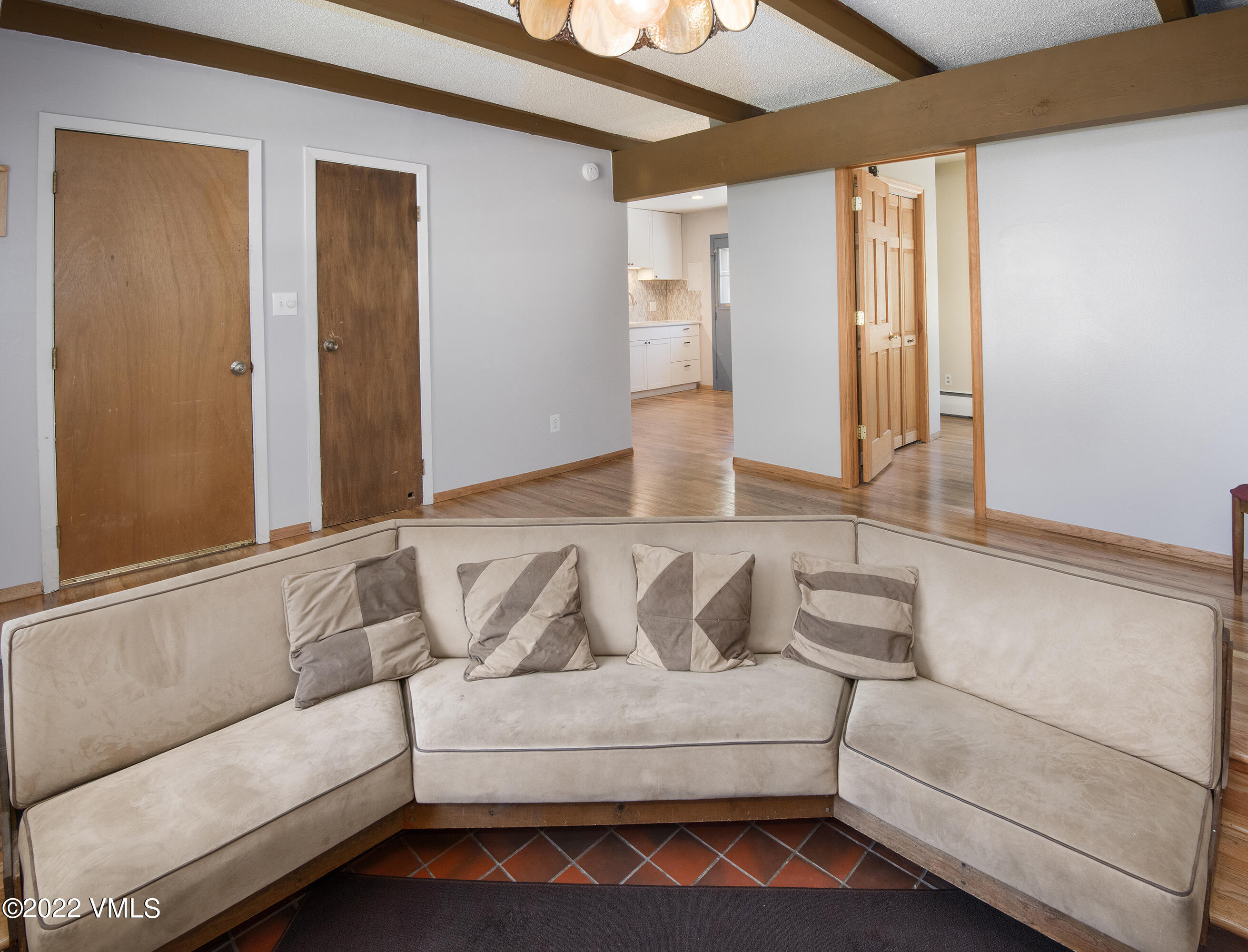 4073 Spruce Way, Unit 22 Vail, CO 81657 - Photo 5 of 25 a view of a bedroom with furniture and a window