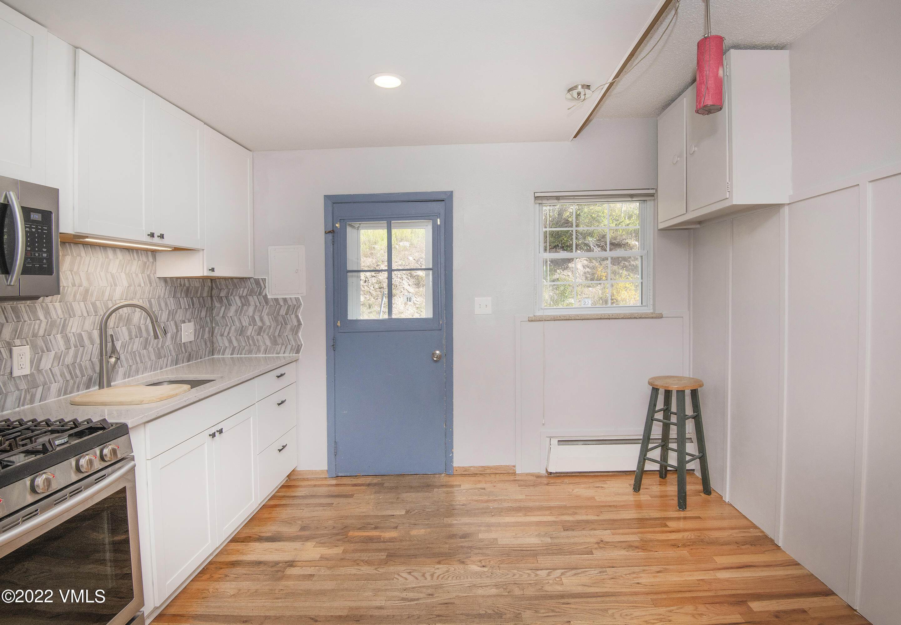 4073 Spruce Way, Unit 22 Vail, CO 81657 - Photo 10 of 25 a kitchen with stainless steel appliances granite countertop a stove and a sink