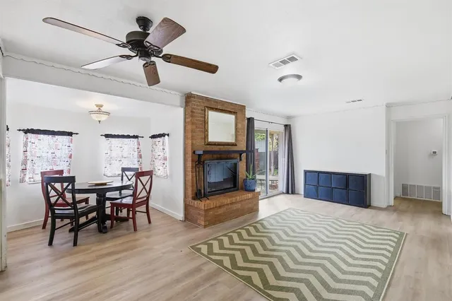 a bedroom with furniture and a fireplace