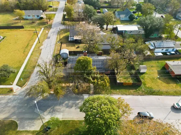 a view of residential houses with outdoor space