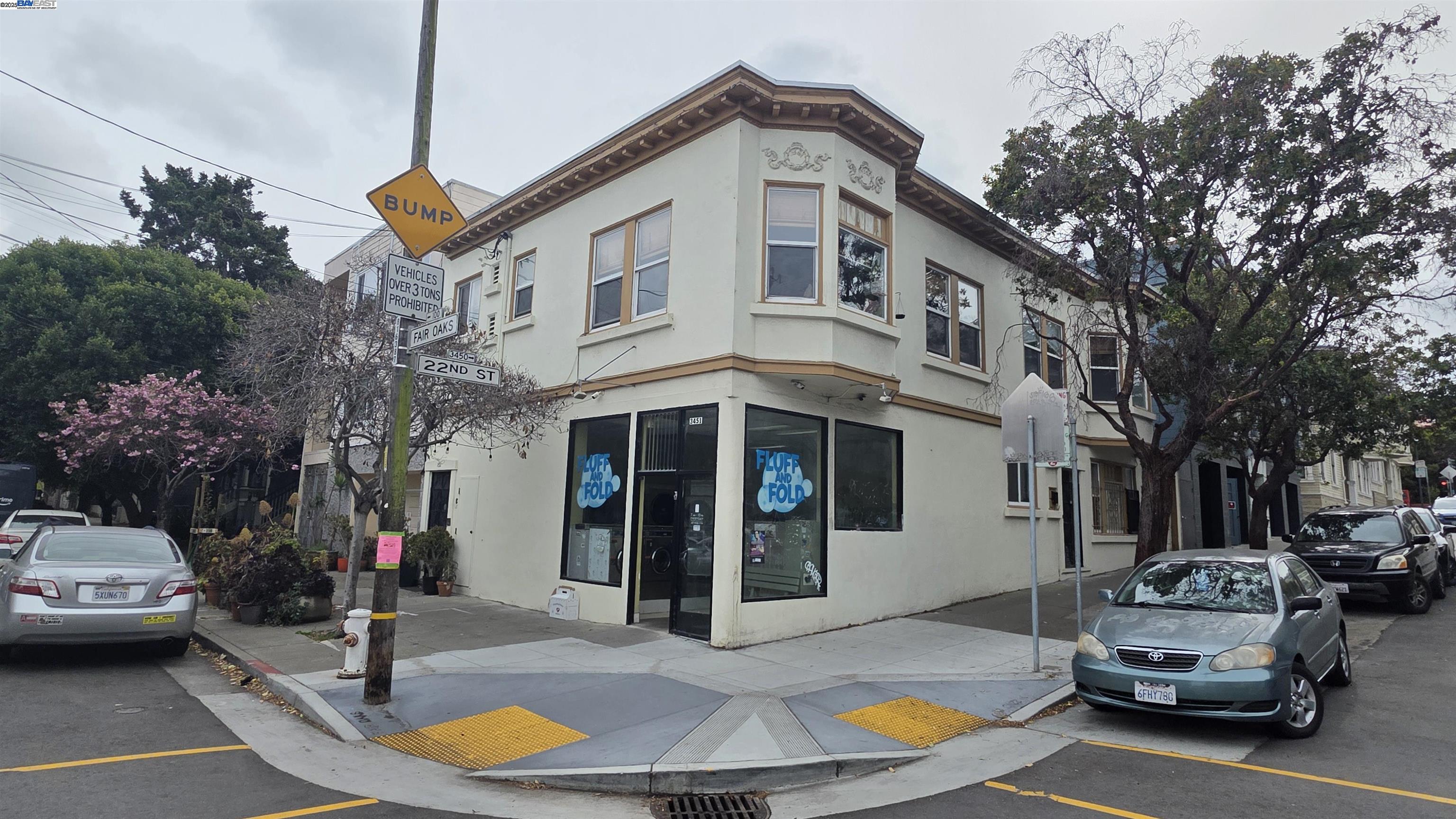 3451 22nd Street San Francisco, CA 94110 - Photo 1 of 10 a view of a white apartments with large windows