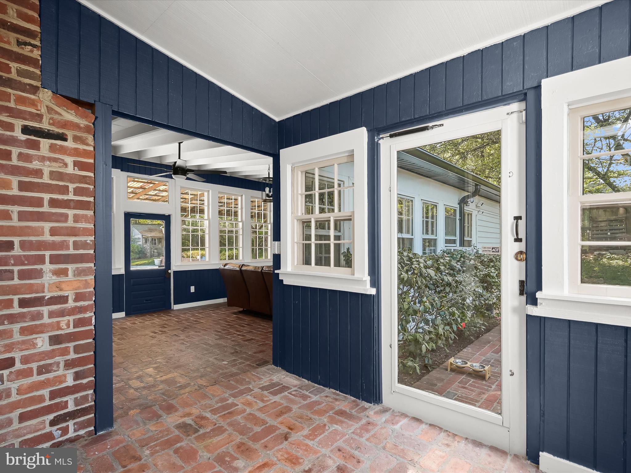 17712 Longdraft Road Gaithersburg, MD 20878 - Photo 30 of 85 a view of a brick house with a large window