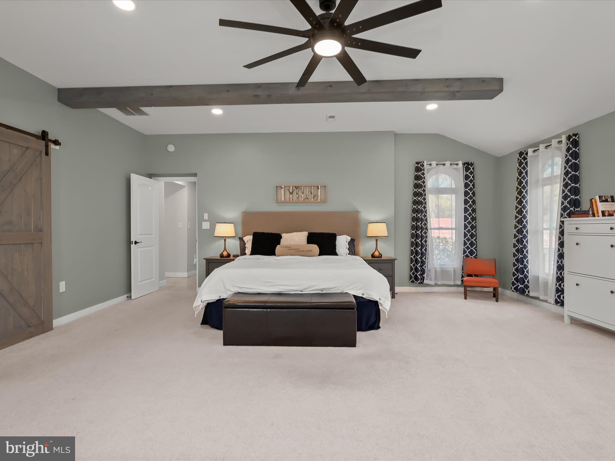 17712 Longdraft Road Gaithersburg, MD 20878 - Photo 37 of 85 a bedroom with a bed and a ceiling fan