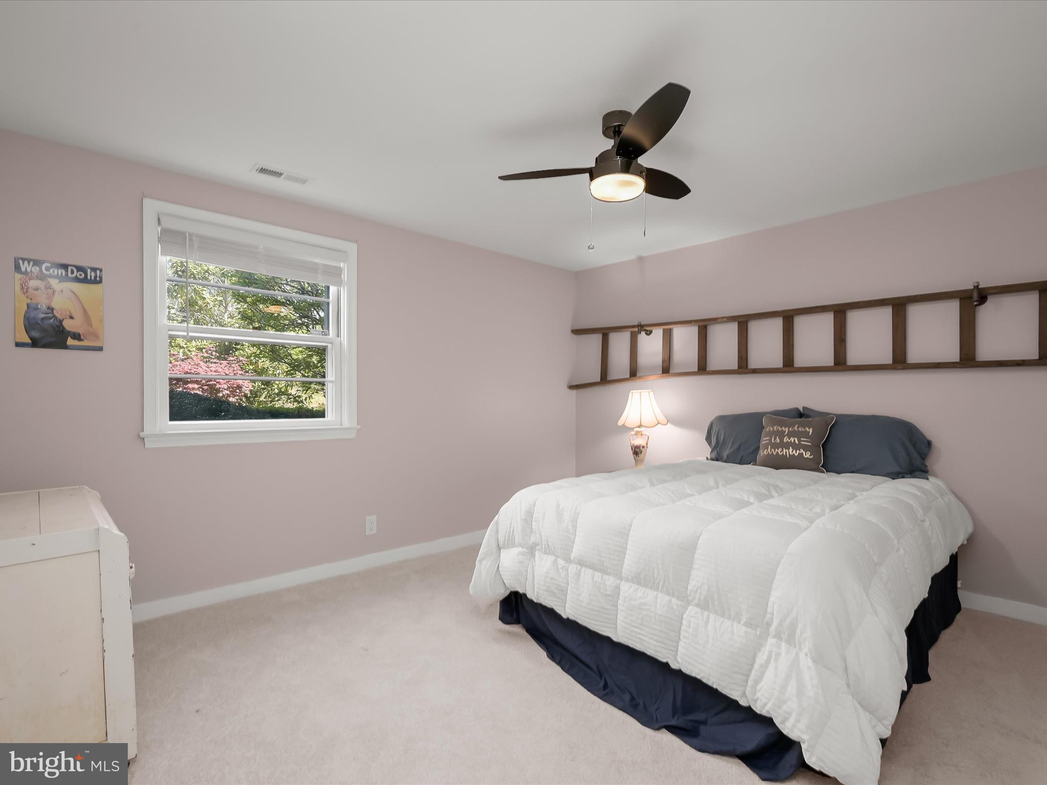17712 Longdraft Road Gaithersburg, MD 20878 - Photo 66 of 85 a bedroom with a bed and window