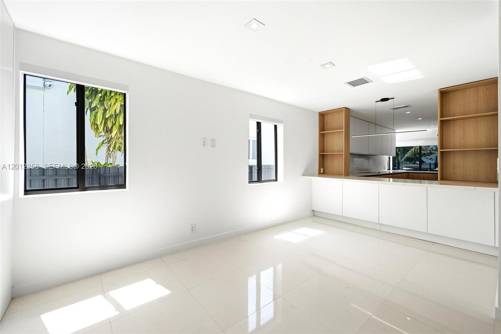 120 Northeast 49th Street Miami, FL 33137 - Photo 13 of 34 a view of a kitchen with a window