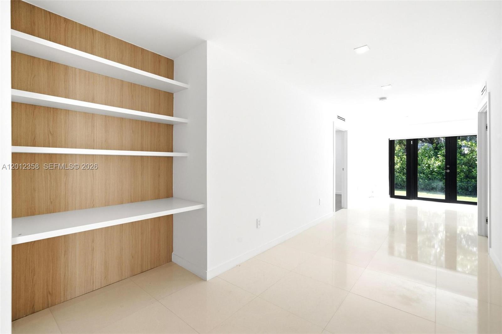 120 Northeast 49th Street Miami, FL 33137 - Photo 15 of 34 a view of an empty room with a window