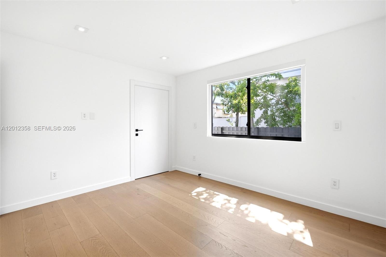120 Northeast 49th Street Miami, FL 33137 - Photo 18 of 34 an empty room with a window