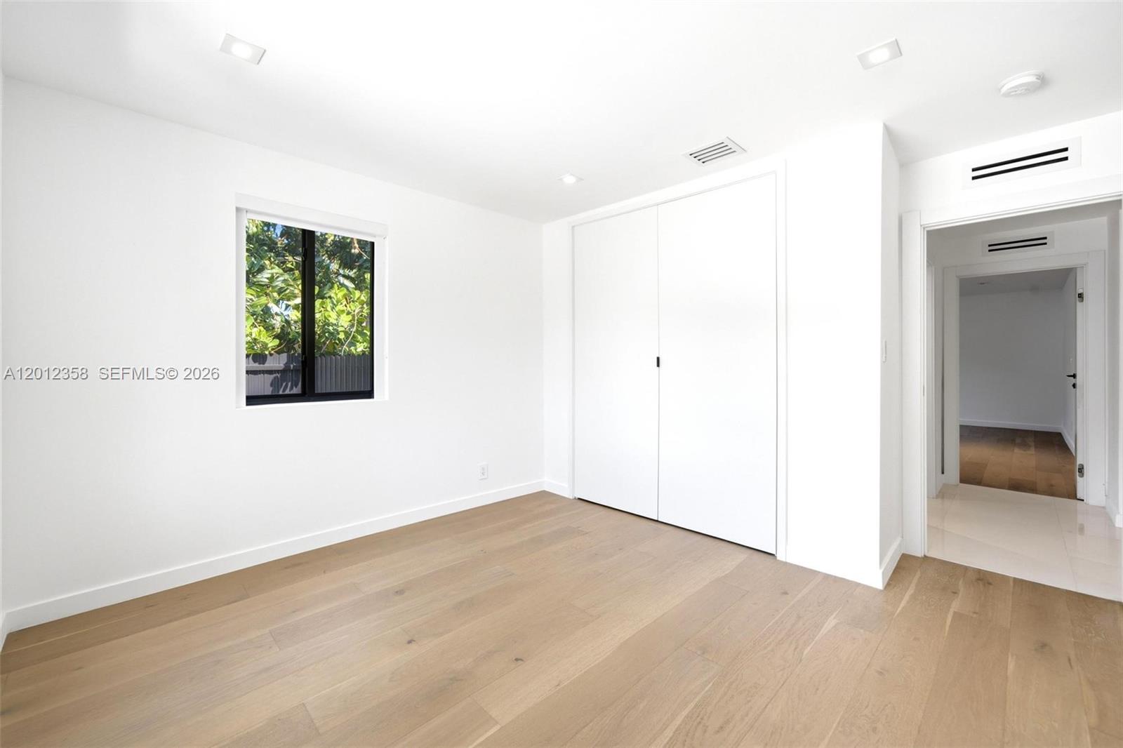 120 Northeast 49th Street Miami, FL 33137 - Photo 26 of 34 a view of an empty room with a window