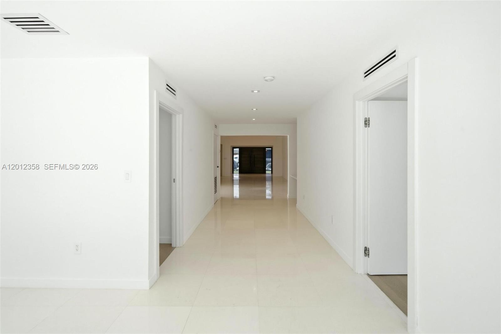 120 Northeast 49th Street Miami, FL 33137 - Photo 29 of 34 a view of a hallway with an empty room