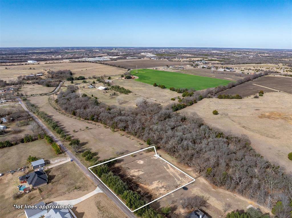 Tbd Lot 5 Cold Springs Road Van Alstyne, TX 75495 - Photo 1 of 10 an aerial view of a large parking space and city view