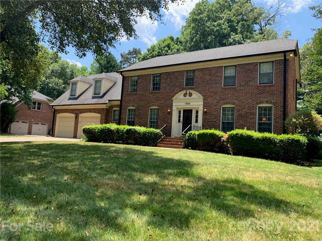 7900 Quail Hill Road Charlotte, NC 28210 - Photo 3 of 28 a front view of a house with a yard