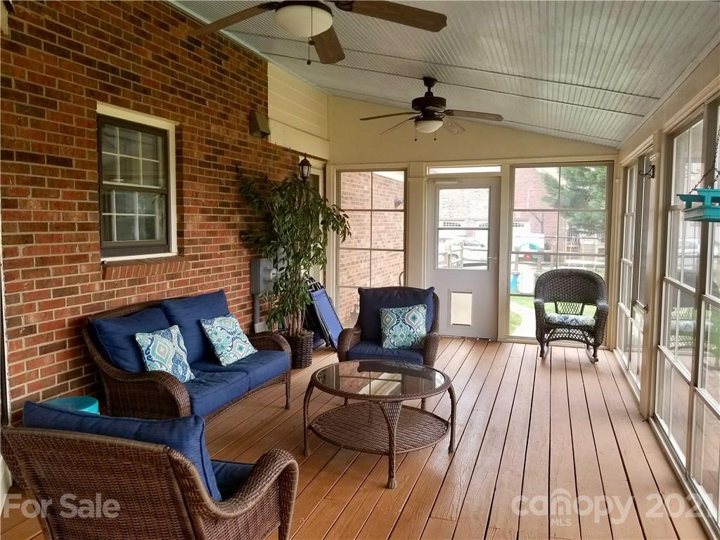 7900 Quail Hill Road Charlotte, NC 28210 - Photo 23 of 28 a outdoor living space with furniture and a rug