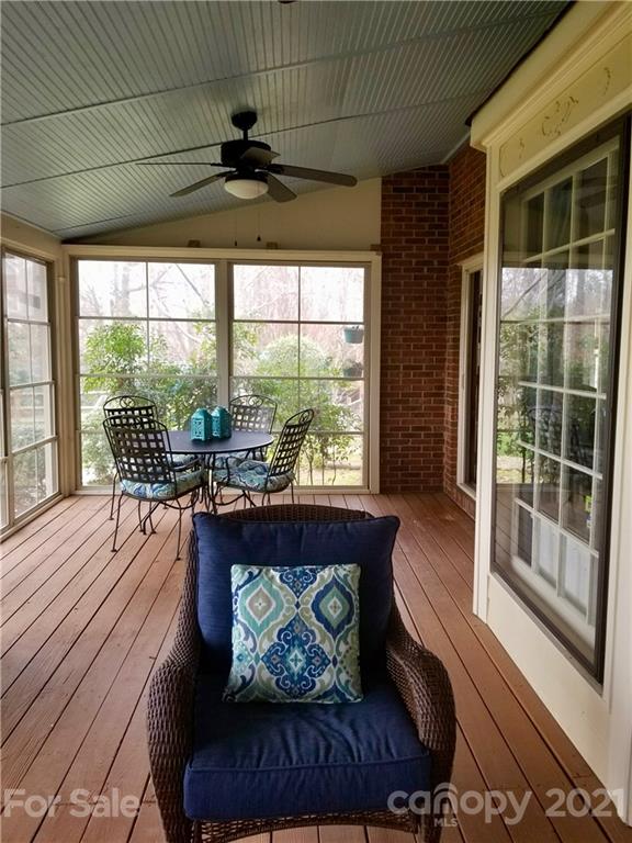7900 Quail Hill Road Charlotte, NC 28210 - Photo 24 of 28 a living room with furniture and a large window