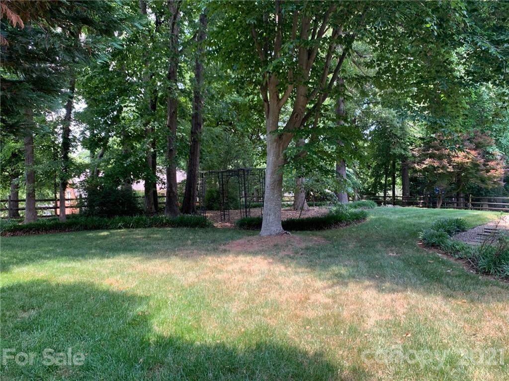 7900 Quail Hill Road Charlotte, NC 28210 - Photo 28 of 28 a view of outdoor space with deck and yard