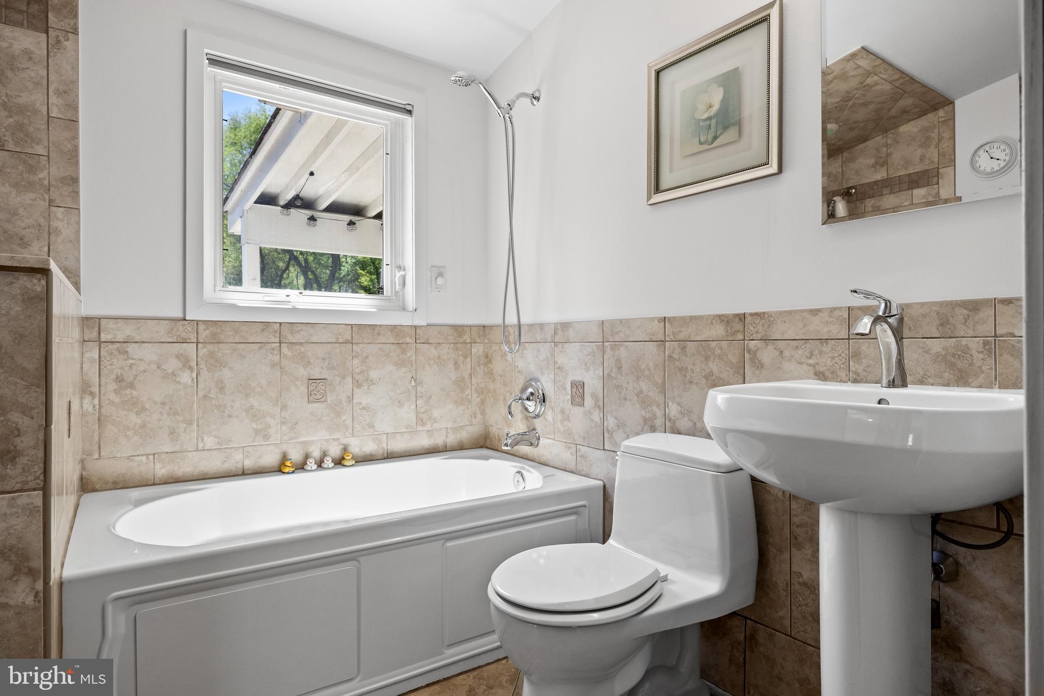 59 Berkley Road Clarksboro, NJ 08061 - Photo 19 of 49 a bathroom with a sink and a toilet