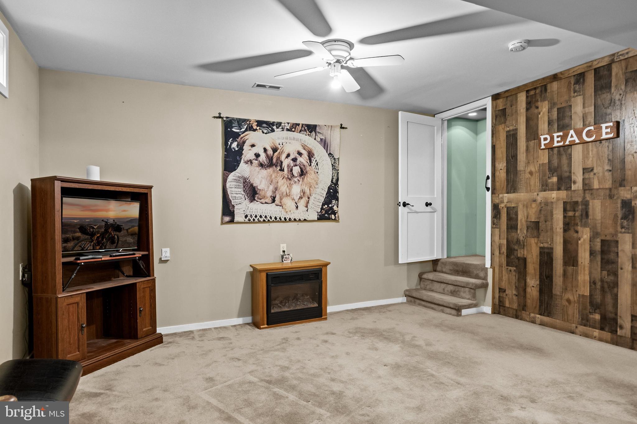 59 Berkley Road Clarksboro, NJ 08061 - Photo 23 of 49 wooden floor with ceiling fan in a living room