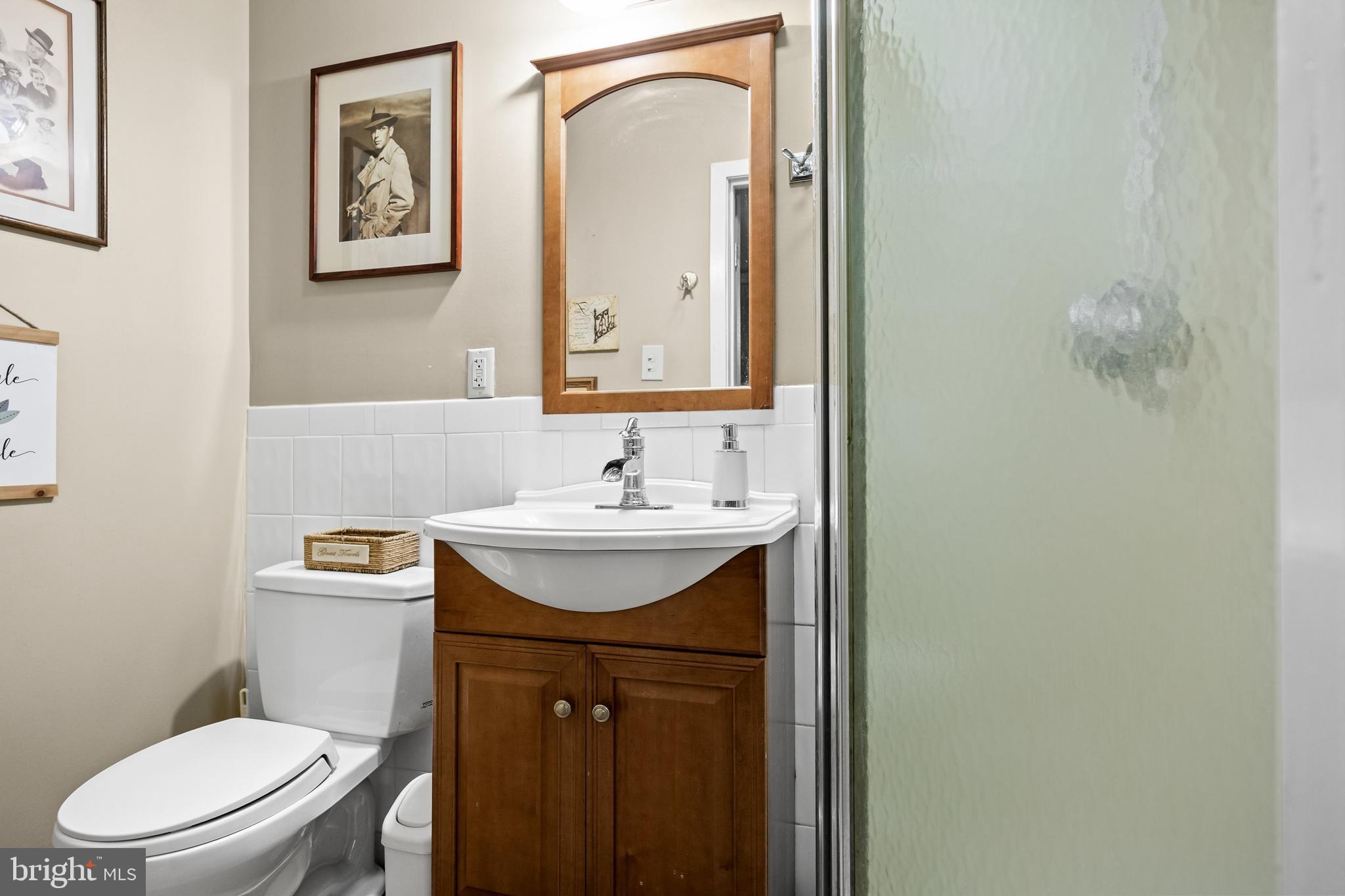 59 Berkley Road Clarksboro, NJ 08061 - Photo 25 of 49 a bathroom with a sink a toilet and mirror