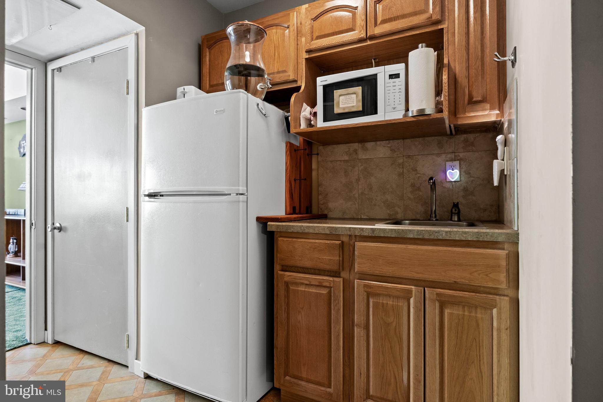59 Berkley Road Clarksboro, NJ 08061 - Photo 26 of 49 a white refrigerator freezer sitting inside of a kitchen