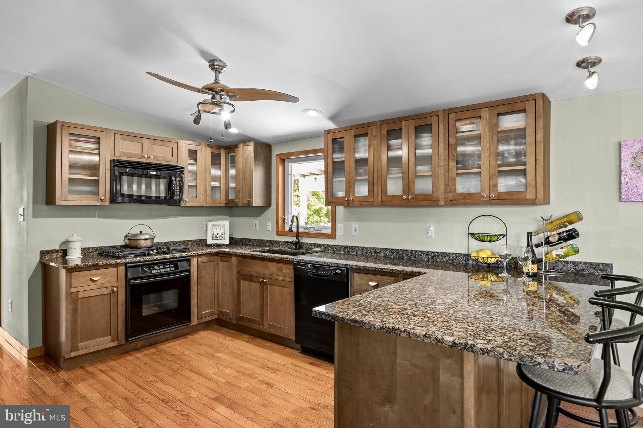 59 Berkley Road Clarksboro, NJ 08061 - Photo 9 of 49 a kitchen with a stove a sink and a microwave