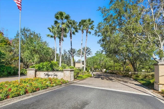 a view of a street with a building in the background