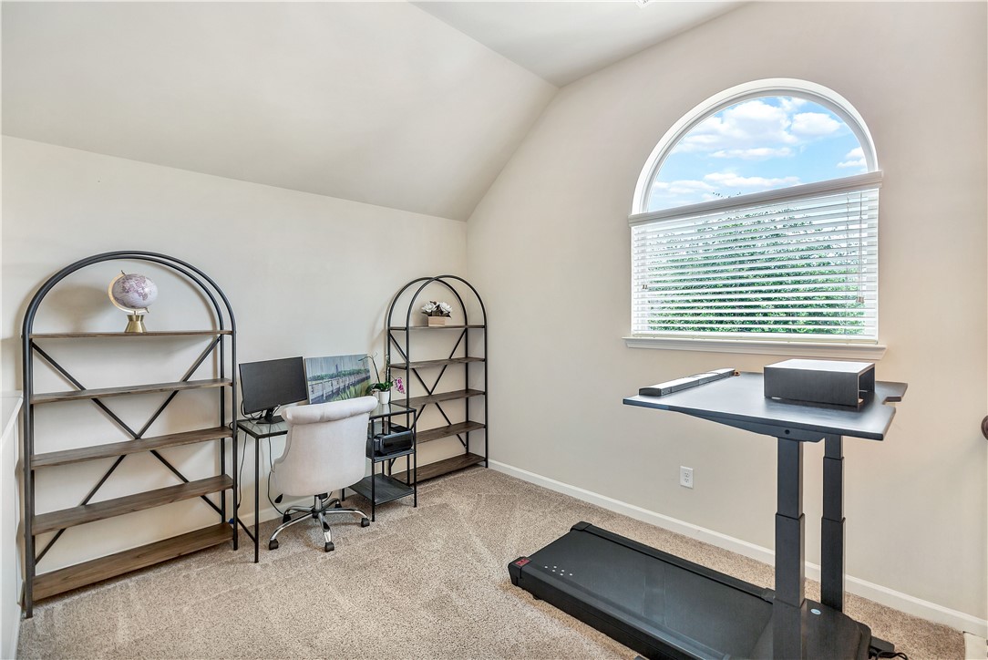 144 Buckland Drive Anderson, SC 29621 - Photo 11 of 48 An arched window bathes this versatile room in natural light, ideal for an office or fitness area.