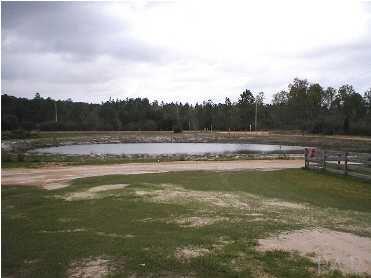 6959 Martin Road Milton, FL 32570 - Photo 4 of 11 a view of ocean view with beach