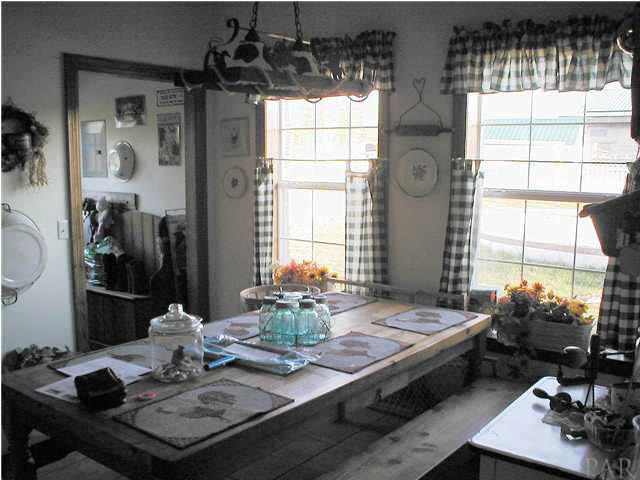 6959 Martin Road Milton, FL 32570 - Photo 5 of 11 a living room with furniture and a window
