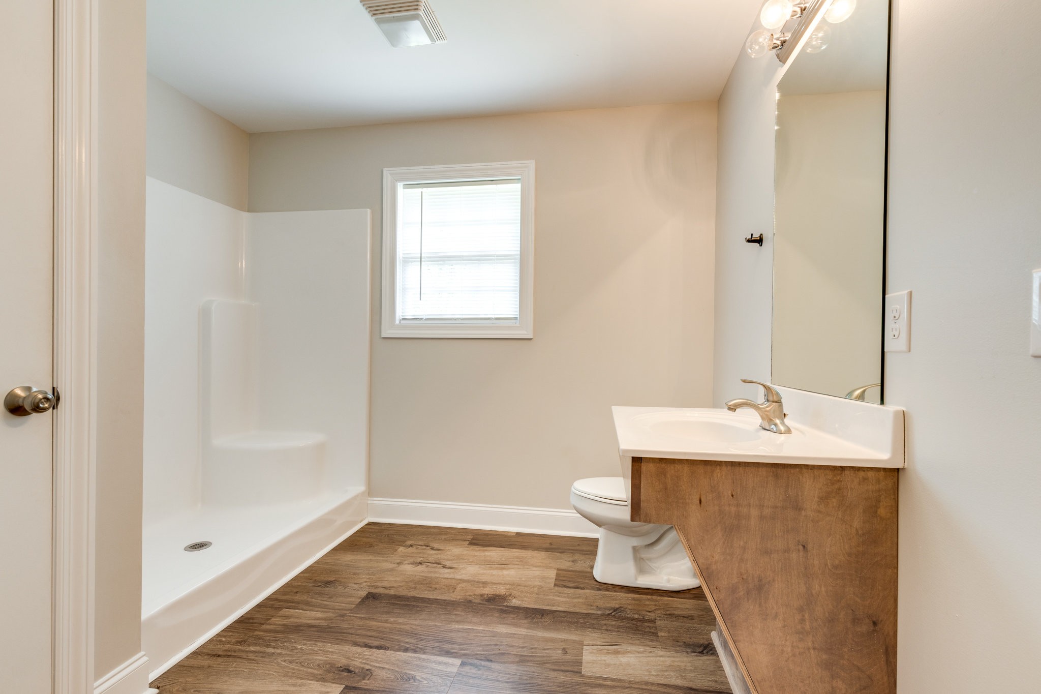 143 Ragsdale Lane Pulaski, TN 38478 - Photo 18 of 22 a bathroom with a sink a toilet and shower