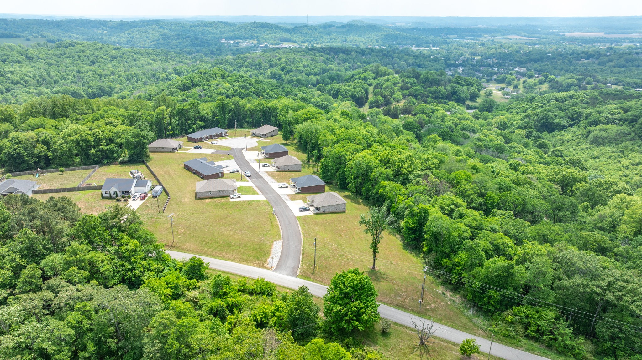 143 Ragsdale Lane Pulaski, TN 38478 - Photo 21 of 22 an aerial view of a house with a yard