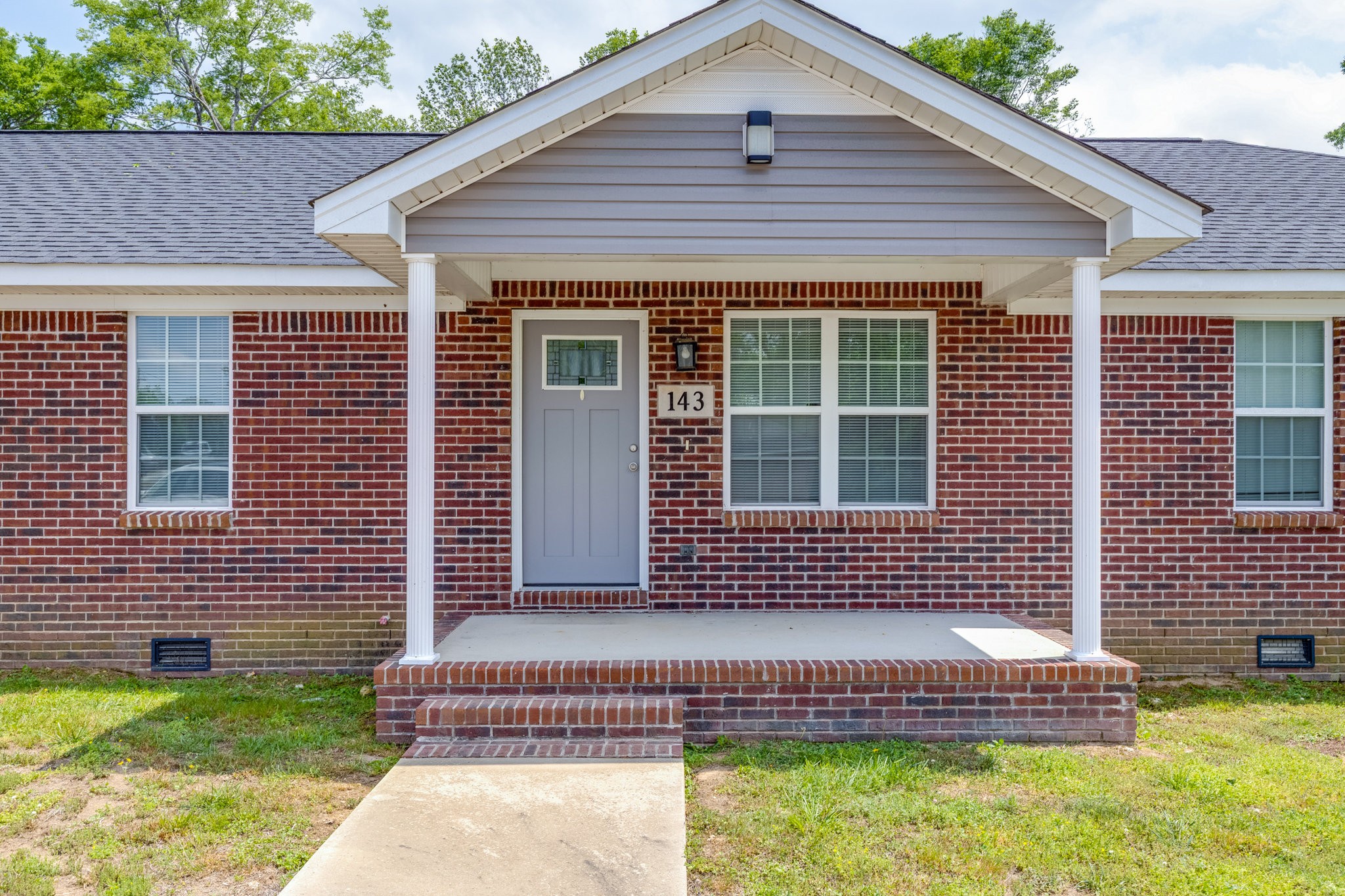 143 Ragsdale Lane Pulaski, TN 38478 - Photo 4 of 22 a front view of a house with a garden