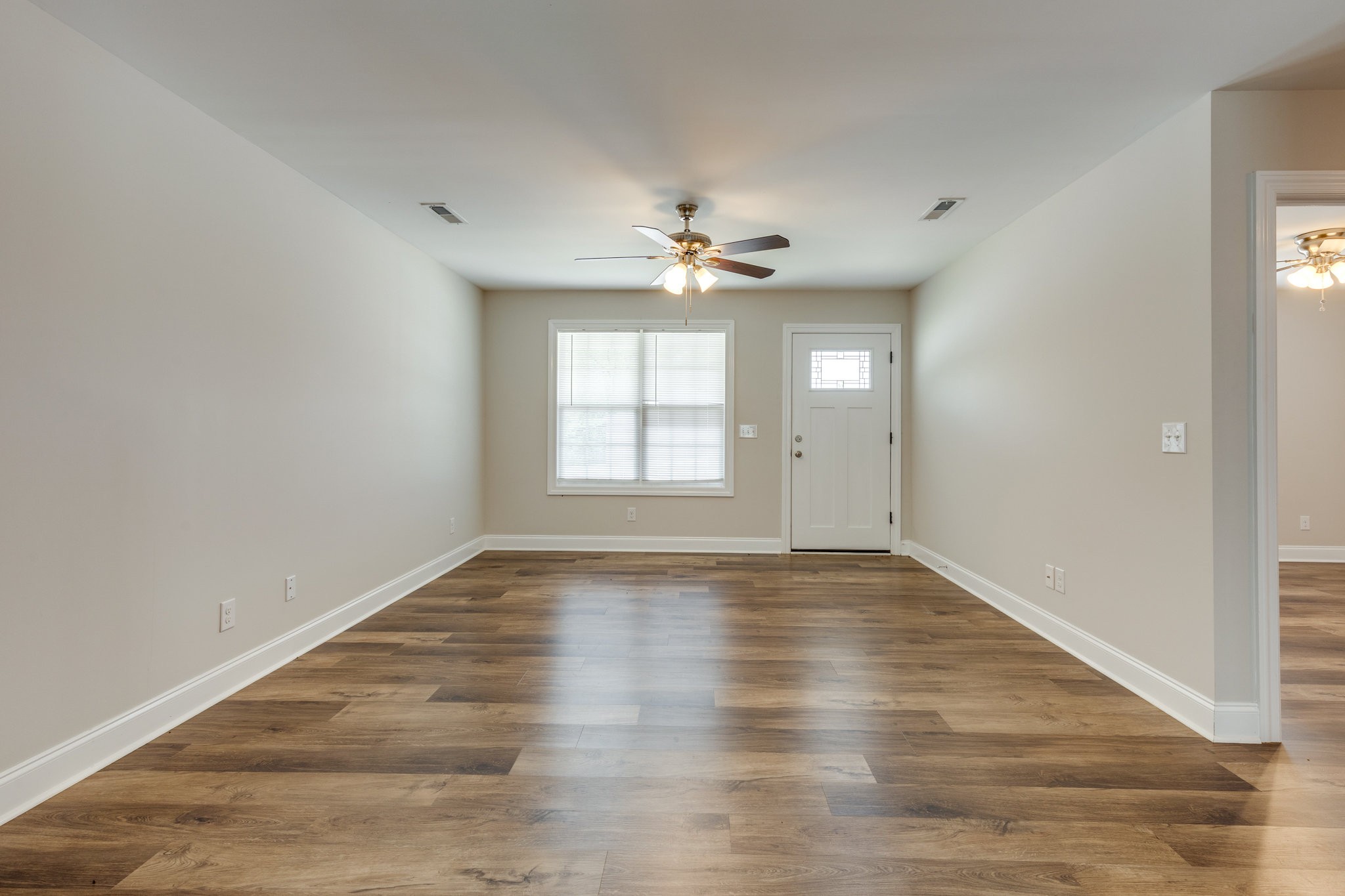 143 Ragsdale Lane Pulaski, TN 38478 - Photo 6 of 22 wooden floor in an empty room with a window