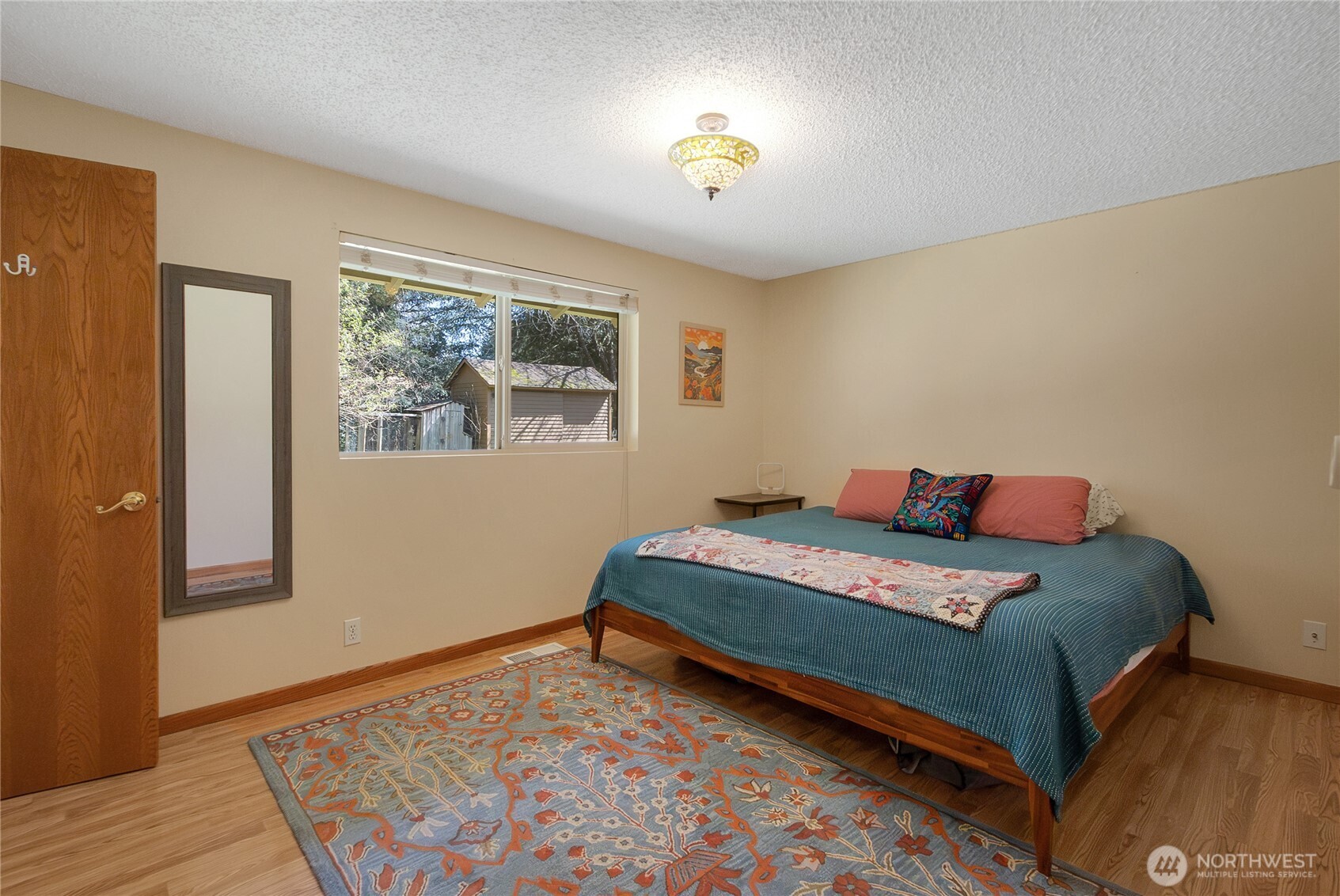 102-40 Crumb Road Morton, WA 98356 - Photo 27 of 40 a bedroom with a bed and a window